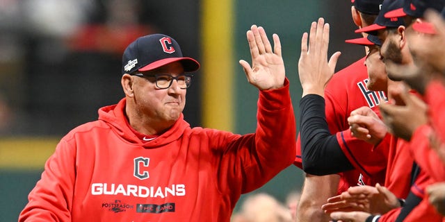 Terry Francona high-fiving Guardians