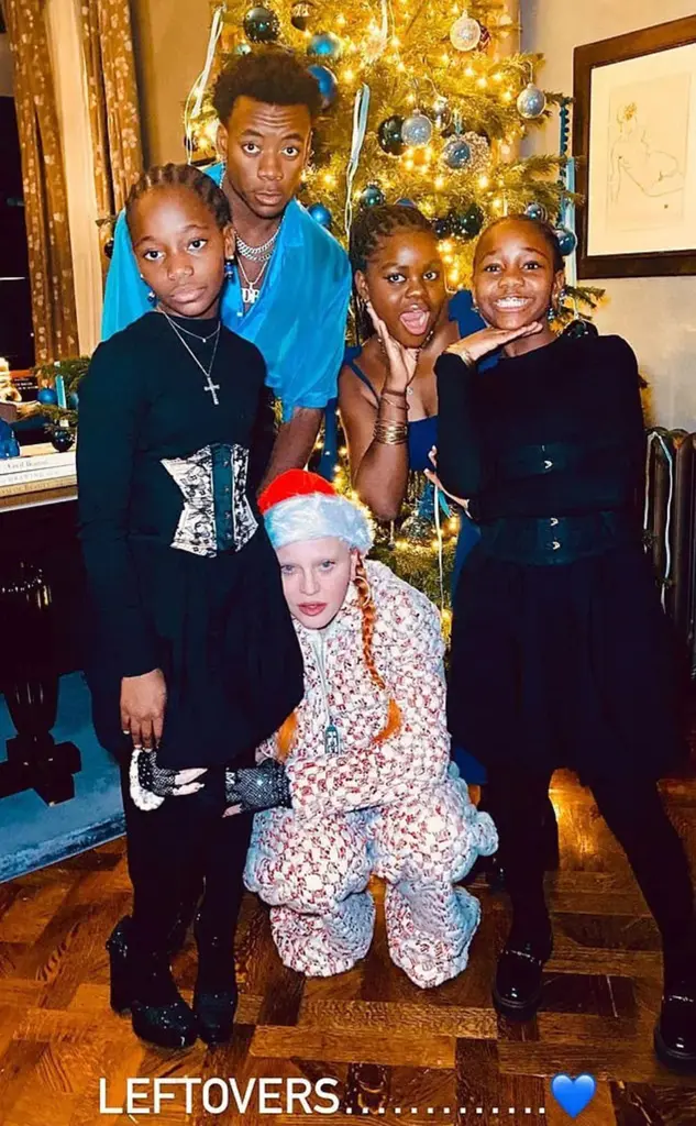 Madonna is seen celebrating Christmas with four of her six children last December.