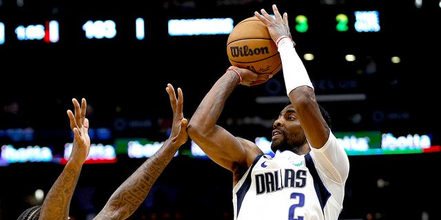 Kyrie shoots the ball during a game