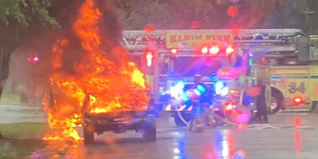 first responders on scene of pickup truck fire