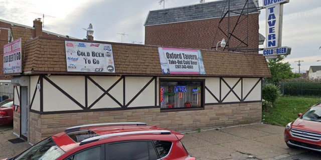 A shabby looking brown bar on a Philadelphia street.