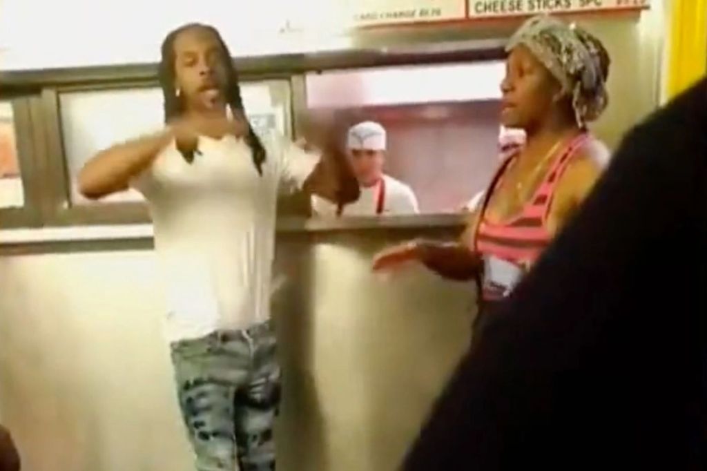 Carlishia Hood and Jeremy Brown can be seen getting into an argument while waiting for food.