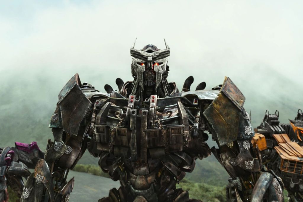 Scourge (voiced by Peter Dinklage) and the Terrorcons fight the Autobots in "Transformers: Rise of the Beasts." 