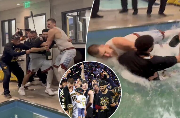 Video shows Denver Nuggets’ Nikola Jokic throws Jamal Murray in the pool after winning NBA Championship