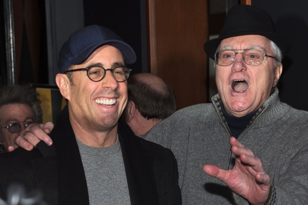 Pat Cooper shares a moment with Jerry Seinfeld in 2015.