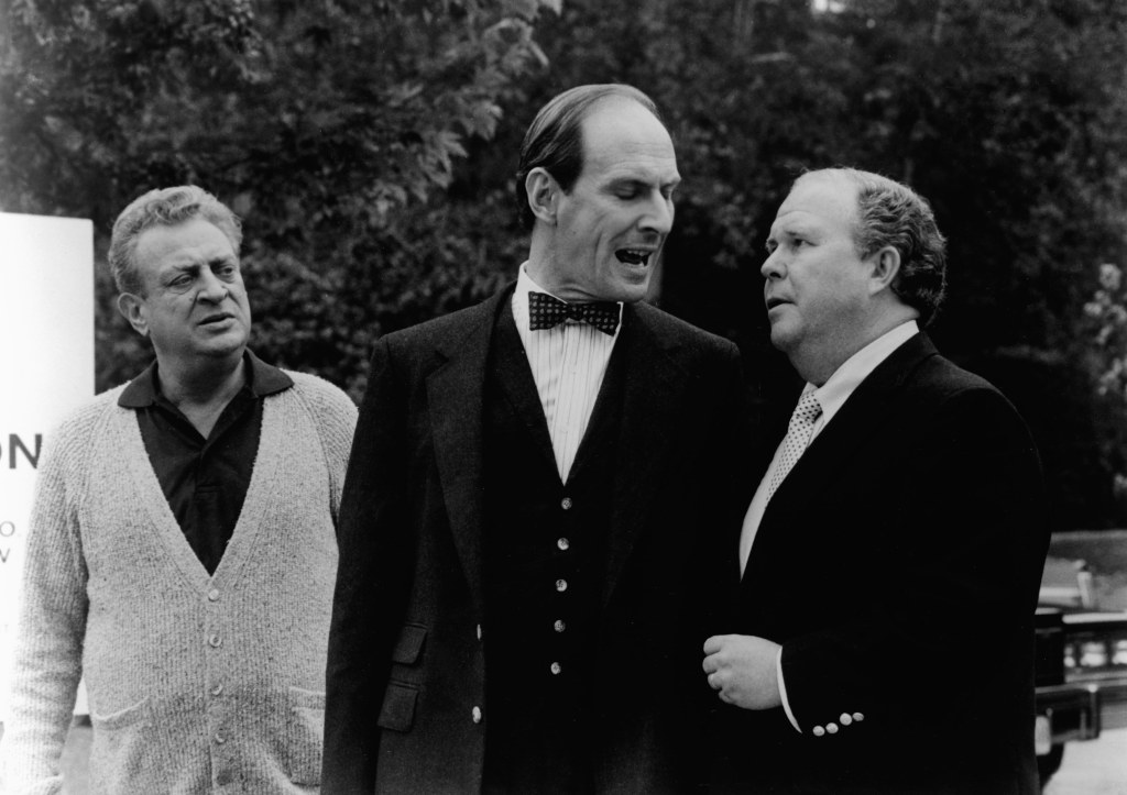 Ned Beatty (L), Whitehead and Rodney Dangerfield in a scene from the 1986 film "Back to School."