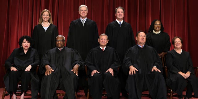 United States Supreme Court (front row L-R) Associate Justice Sonia Sotomayor, Associate Justice Clarence Thomas, Chief Justice of the United States John Roberts, Associate Justice Samuel Alito, and Associate Justice Elena Kagan, (back row L-R) Associate Justice Amy Coney Barrett, Associate Justice Neil Gorsuch, Associate Justice Brett Kavanaugh and Associate Justice Ketanji Brown Jackson pose for their official portrait