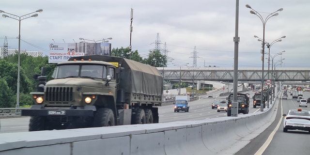 Armored vehicles belonging to the Wagner group travel along the M4 highway towards Moscow