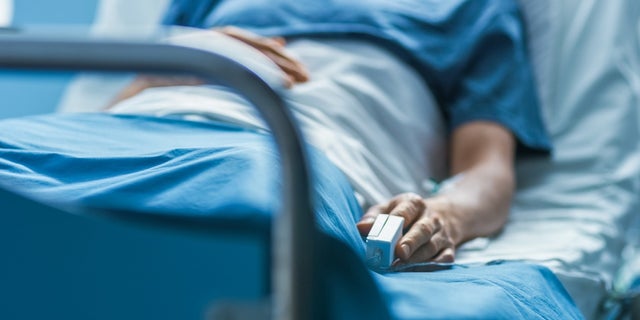 Patient on hospital bed