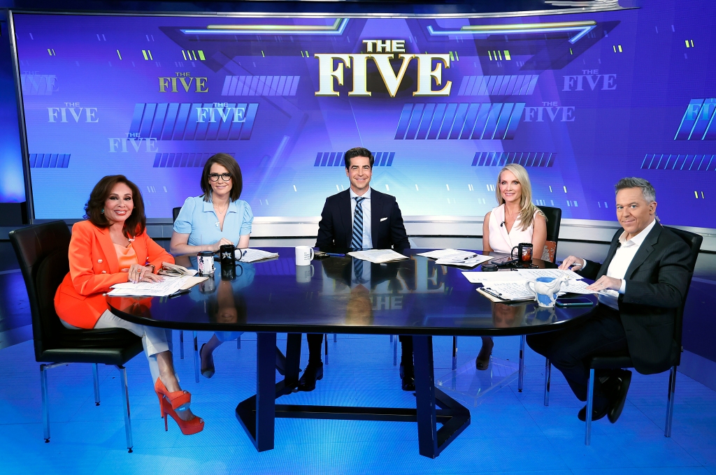 Hosts of "The Five" seated at a table