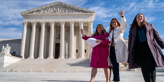 Christian graphic designer seen outside Supreme Court