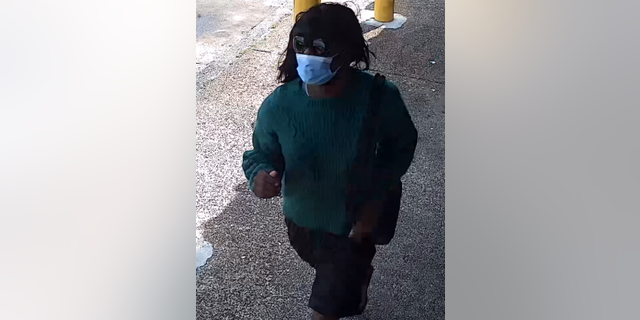 Suspect walking away from robbery