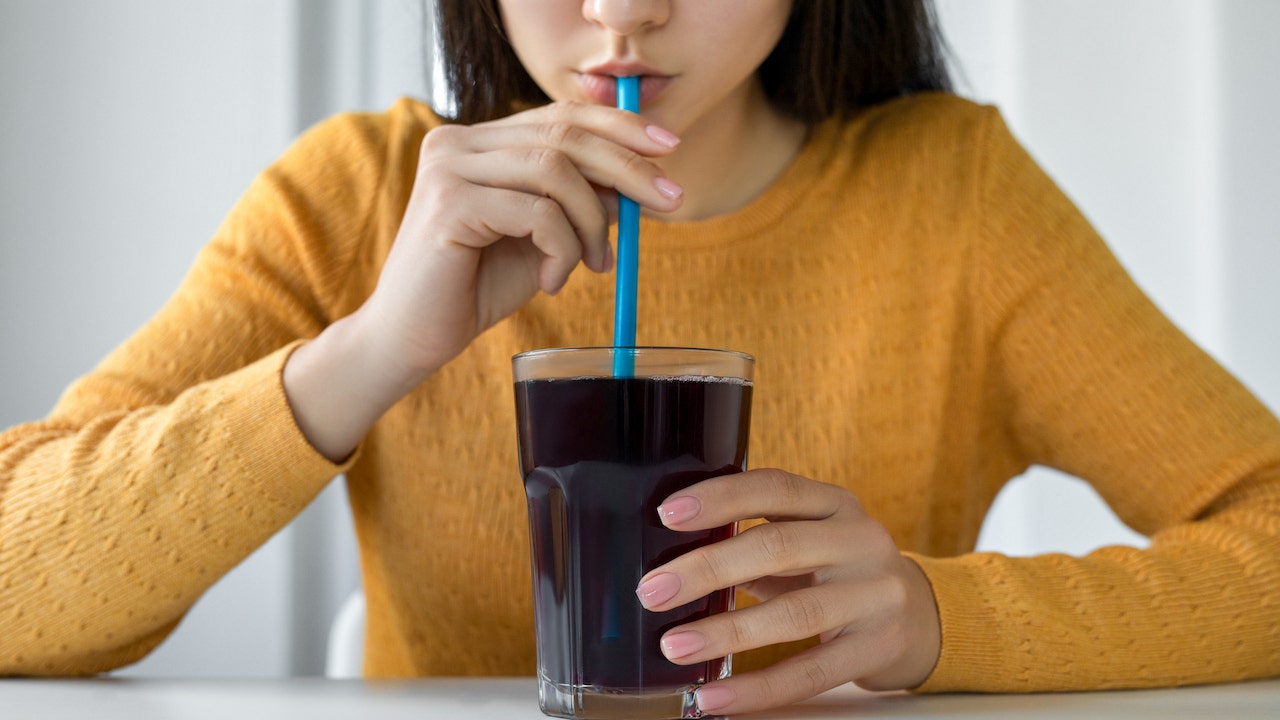 Person drinking soda