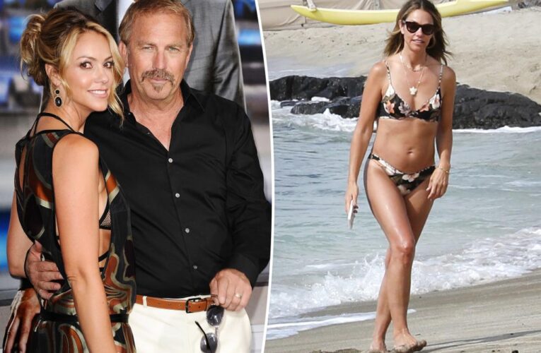 Kevin Costner’s estranged wife snapped on vacation with his friend