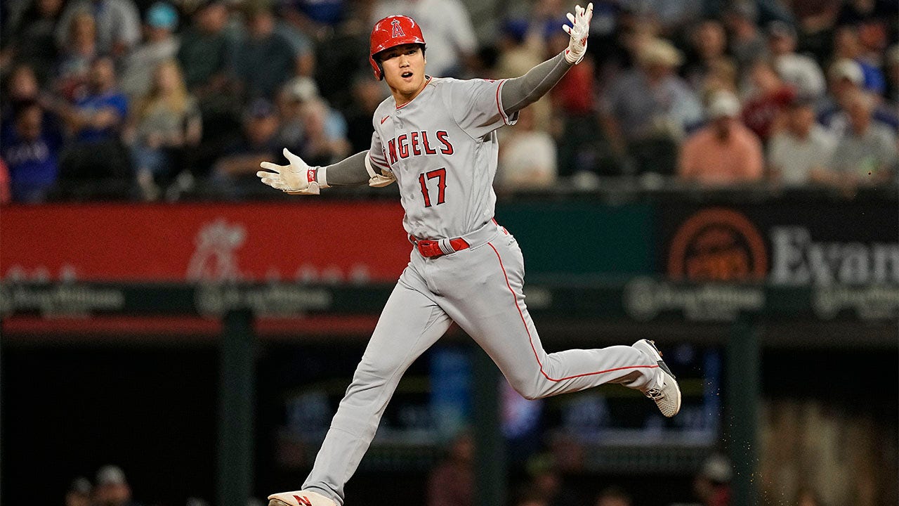 Shohei Ohtani runs the bases after a home run