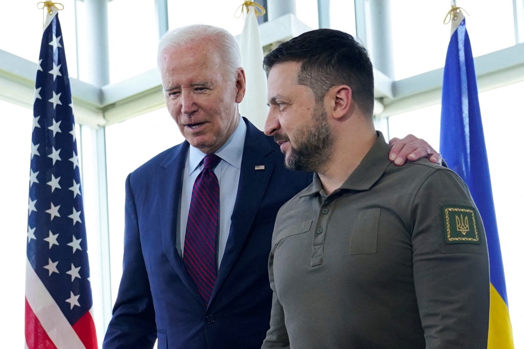 President Joe Biden, walks with Ukrainian President Volodymyr Zelenskiy ahead of a working session on Ukraine during the G7 Summit in Hiroshima, Japan, Sunday, May 21, 2023.  
