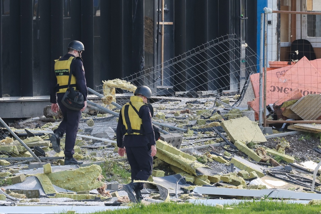 Debris by a damaged business center is shown after a drone attack in Moscow July 24, 2023. 