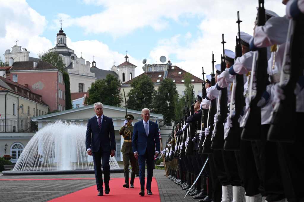 President Joe Biden and Lithuanian President Gitanas Nauseda (left) review a military honor guard during an official welcome ceremony at the Presidential Palace as Biden arrives to attend a NATO Summit in Vilnius, Lithuania, on July 11, 2023. 