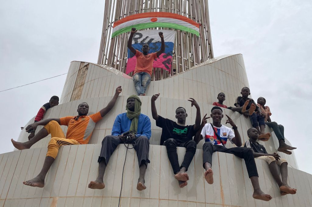 Nigerian defense and security force supporters gather during a demonstration on Thursday.