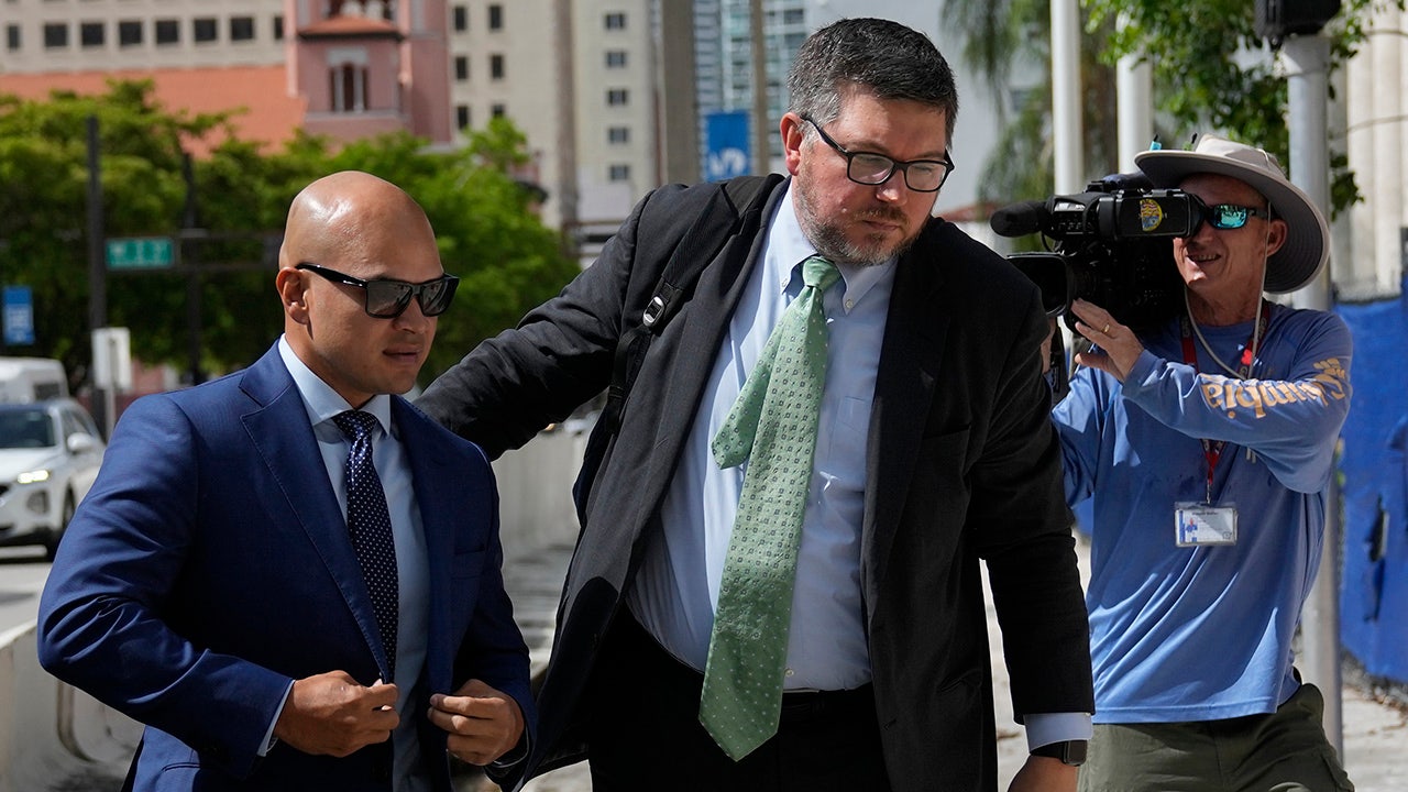 Nauta and attorney outside Miami court