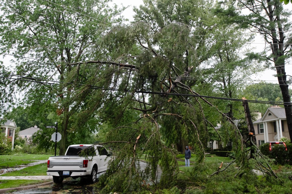 Downed tree limbs are seen after the severe storm in Grosse Pointe Farms, Mich., on July 26, 2023.