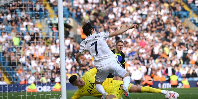 Fraser Forster saves Brenden Aaronsons shot