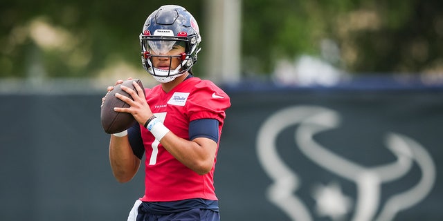 C.J. Stroud throws during rookie mini camp