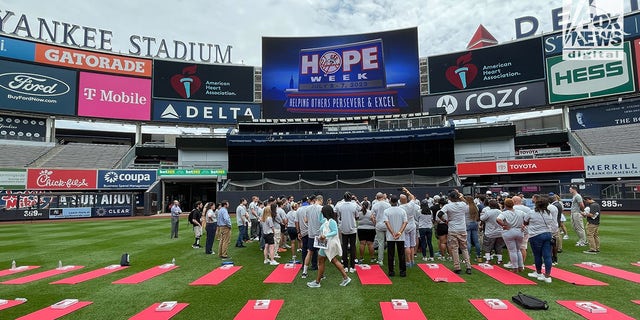 The media gather at Yankee Stadium