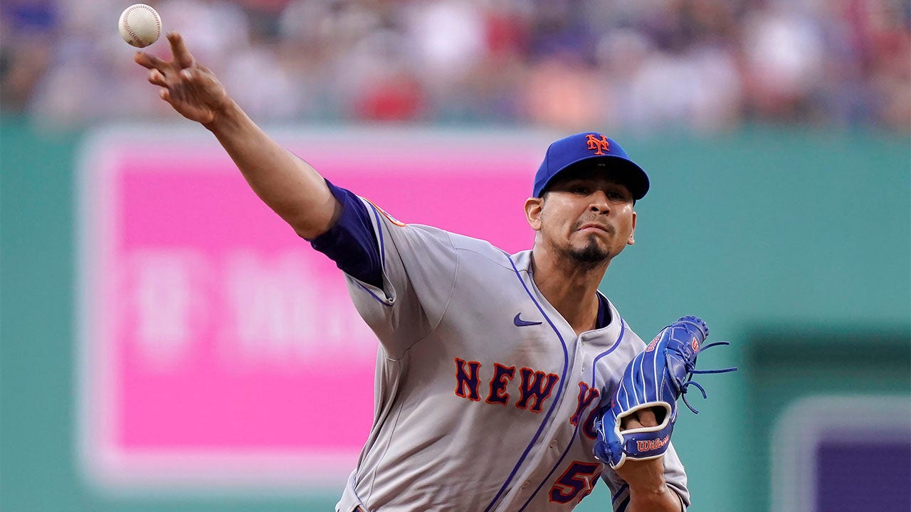 Carlos Carrasco throws pitch