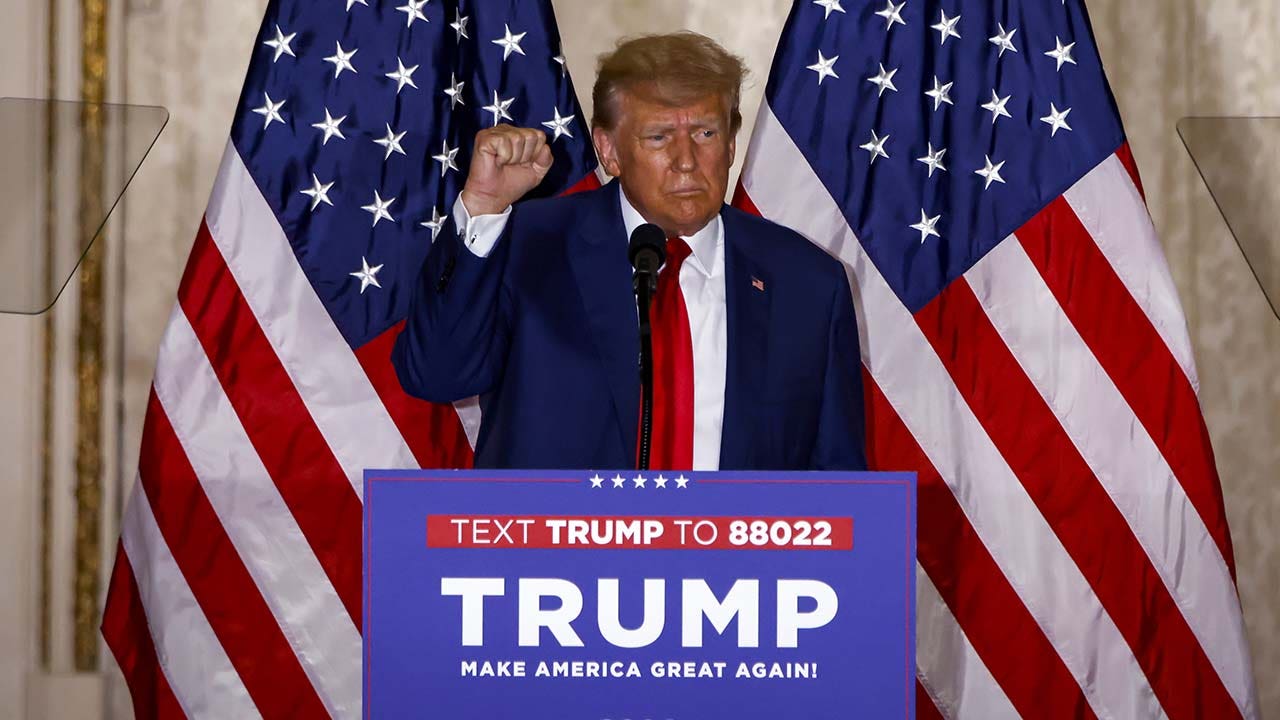 Former US President Donald Trump delivers remarks at the Mar-a-Lago Club.