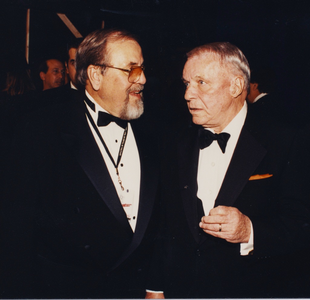 George and Frank Sinatra at Sinatra's 80th birthday party.