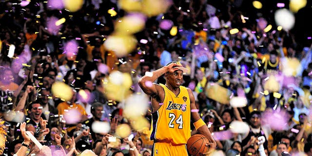 Kobe Bryant celebrates after winning an NBA championship