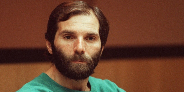 Ronald DeFeo wearing green sweatshirt in court in 1992