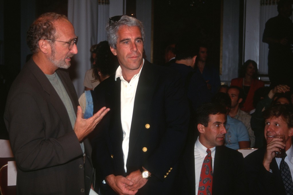 Guest and Jeffrey Epstein attend the Victoria's Secret Fashion Show at the Plaza Hotel on August 1, 1995 in New York City.