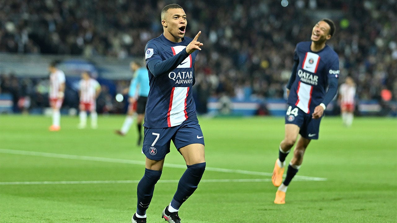 Kylian MBAPPE celebrates a goal