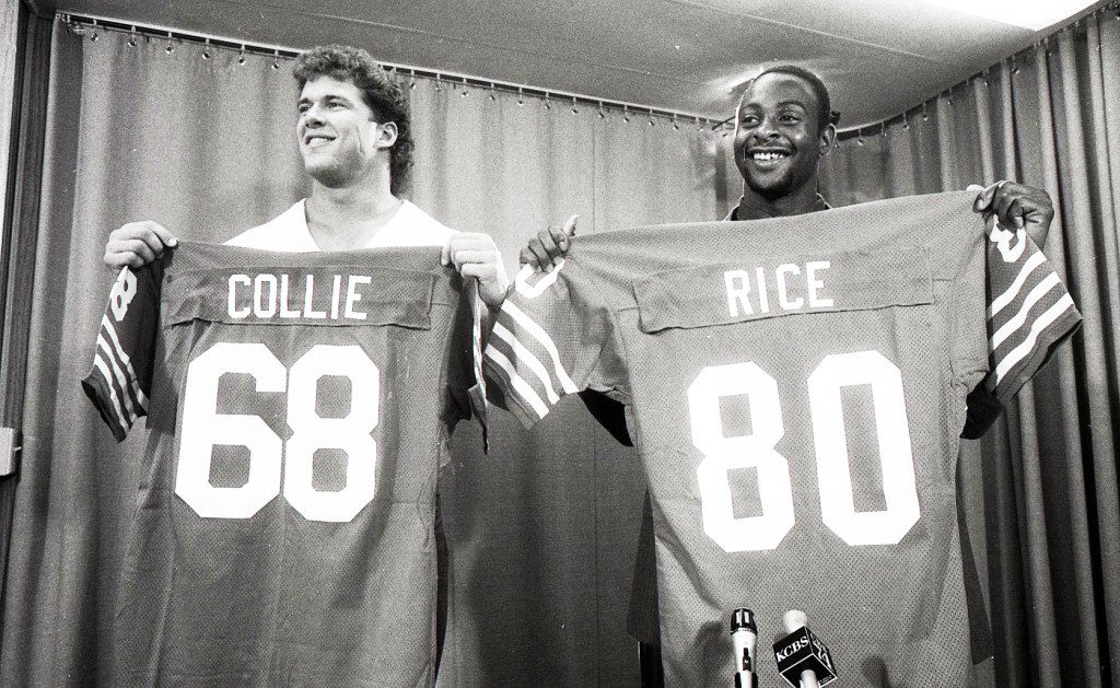 Bruce Collie and Jerry Rice poses with their jersey, after being drafted by the 49ers in 1985.