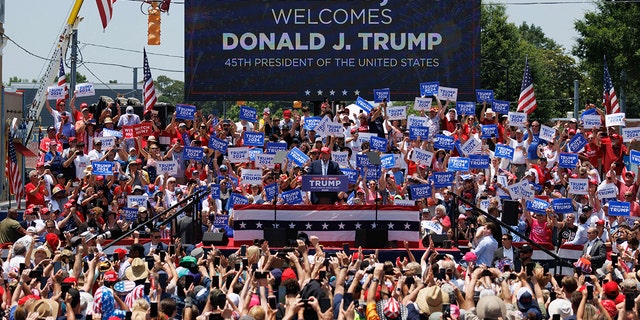 A big crowd watches as Trump speaks