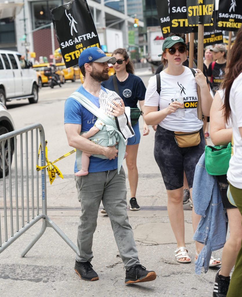 Darke, 38, was seen holding a "SAG-AFTRA on Strike" sign on the picket line.