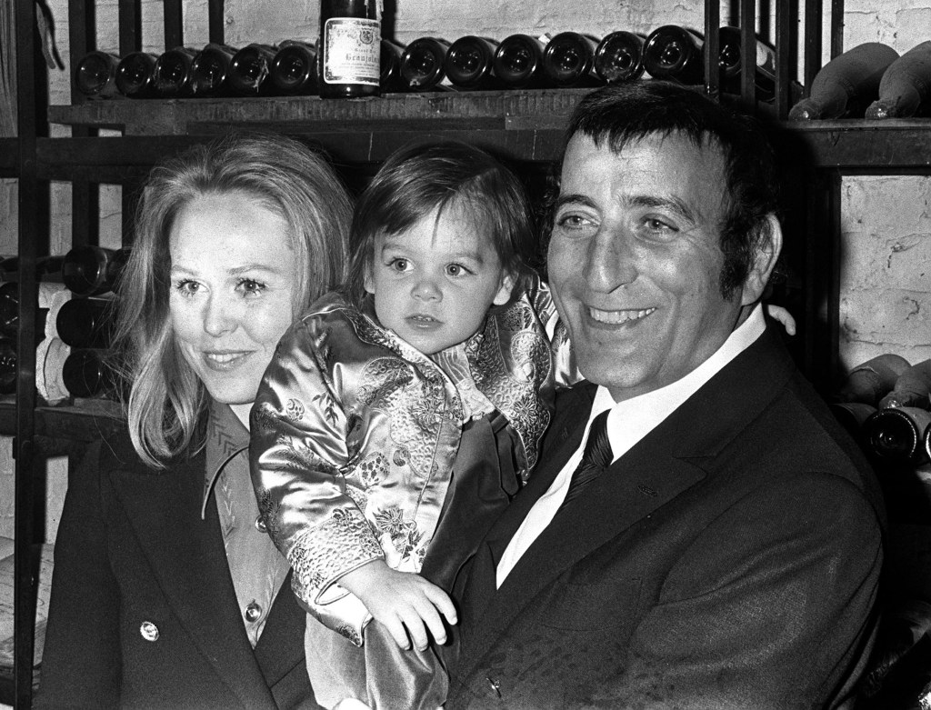Bennett is pictured with his wife Sandie Grant and their daughter Joanna during a visit to London 