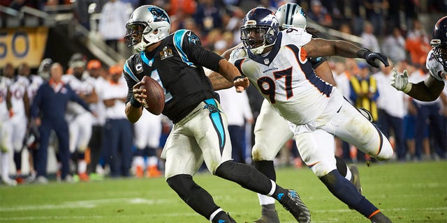 Malik Jackson chases Cam Newton