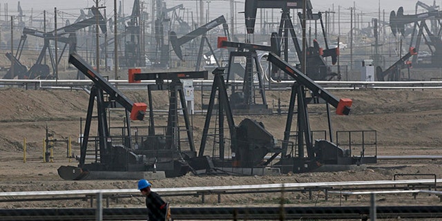 Pumpjacks operate at the Kern River Oil Field, Friday, Jan. 16, 2015, in Bakersfield, Calif. California regulators authorized oil companies more than 2,500 times to inject wastewater and other production-related fluids into federally protected aquifers potentially suitable for drinking and watering crops in the nation’s agricultural center, state records show. (AP Photo/Jae C. Hong)