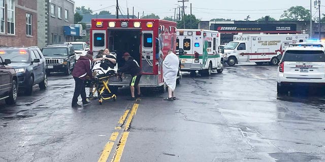 Emergency responders outside of the Lockport Cave.