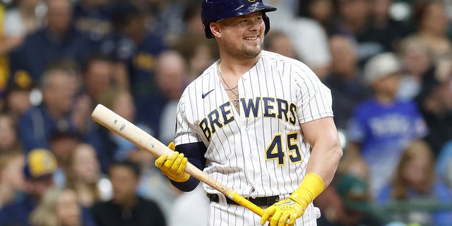 Luke Voit smiles on field