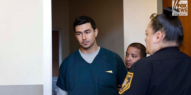 Matthew Nilo in a New Jersey courtroom in jumpsuit