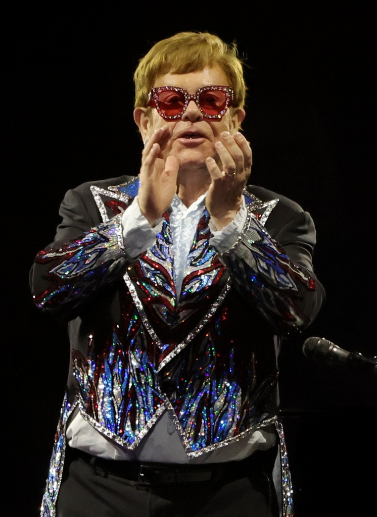 Elton John performing