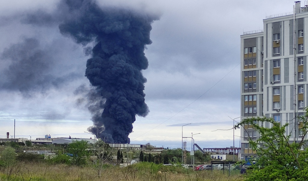 Smoke rises over a fuel tank following an alleged drone attack in Sevastopol, Crimea, April 29, 2023.