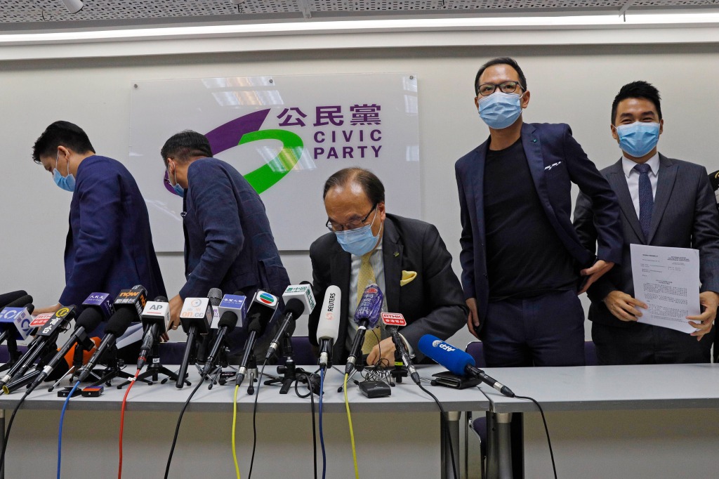 From right, pro-democracy Civic Party members, Cheng Tat-hung, Dennis Kwok, Alan Leong, Alvin Yeung and Jeremy Tam leave a news conference after being disqualified for a legislative election in Hong Kong, July 30, 2020.