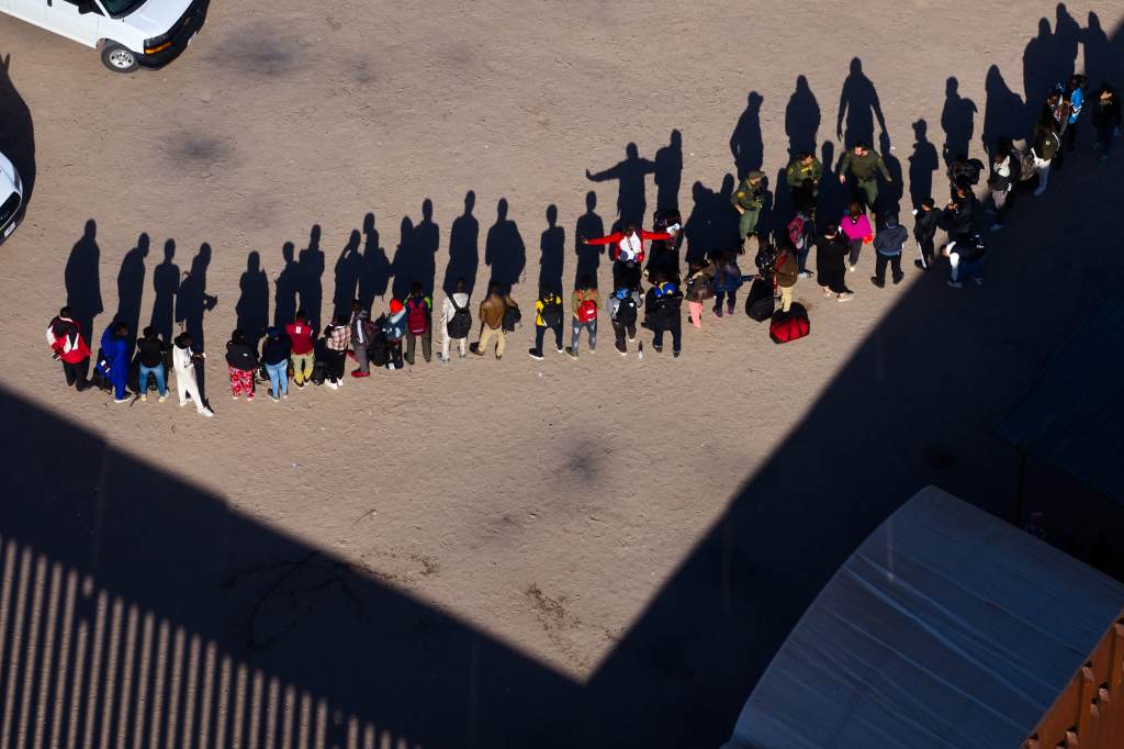 Migrants surrendering to Customs and Border Protection officers in San Luis, Arizona on June 6, 2023.