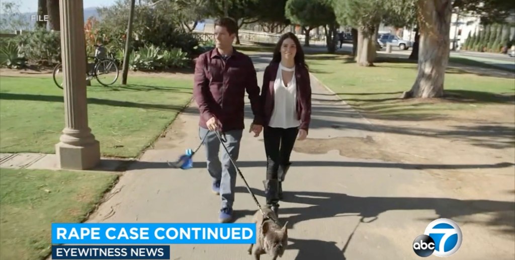 Robicheaux and Riley walking a dog