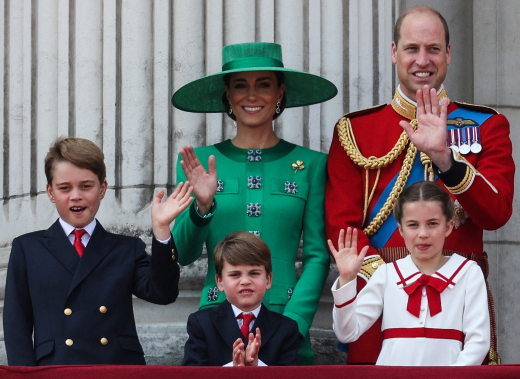 Britain's Prince George of Wales, Britain's Catherine, Princess of Wales, Britain's Prince Louis of Wales, Britain's Prince William, Prince of Wales and Britain's Princess Charlotte of Wales wave from the balcony of Buckingham Palace after attending the King's Birthday Parade, 'Trooping the Colour', in London on June 17, 2023.